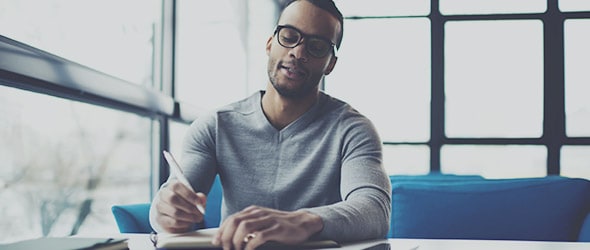 Man reviewing his options to pay off his income tax bill.