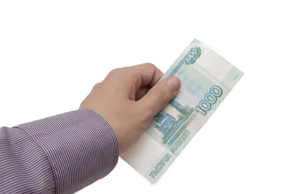 Рука держит банкнота номиналом 1000 рублей — стоковое фото