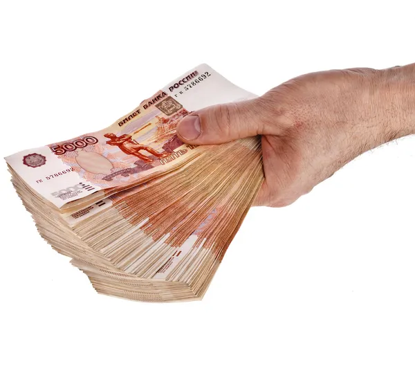 Куча миллион рублей российских банкнот в руке человек — стоковое фото